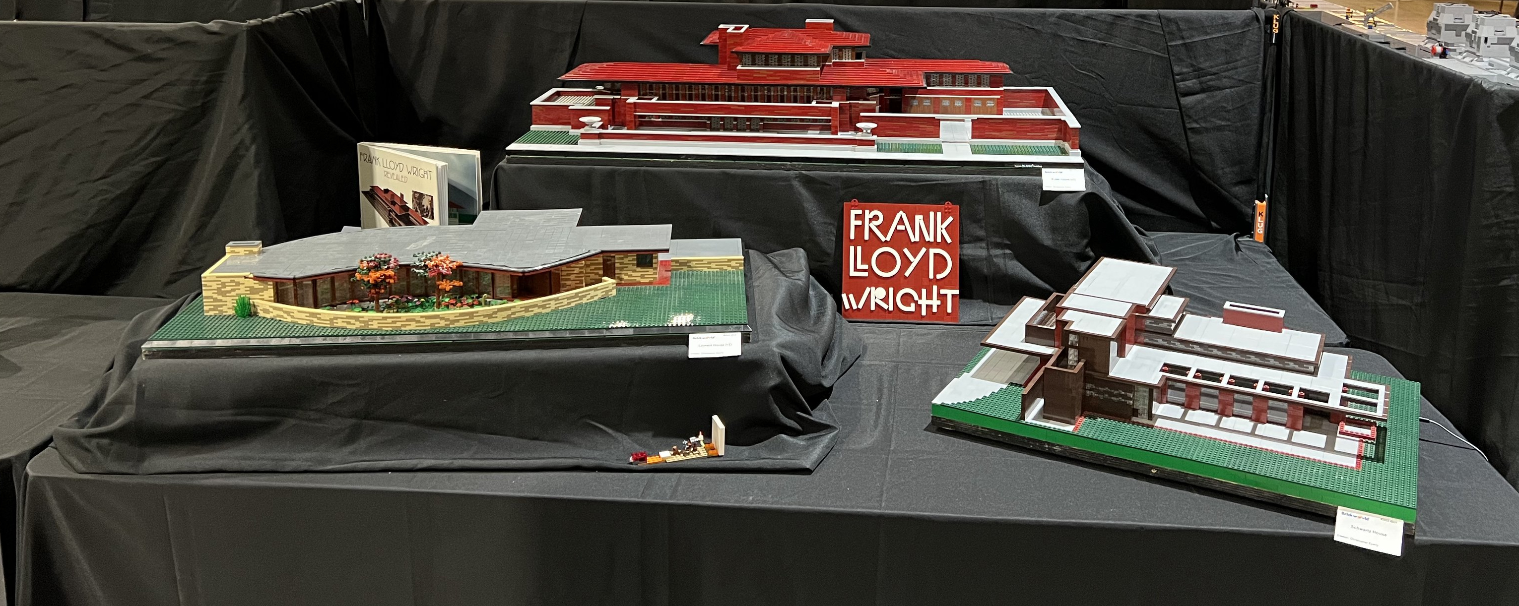 a photo of display of three Frank Lloyd Wright buildings - the Robie House, the Laurent House and Still Bend